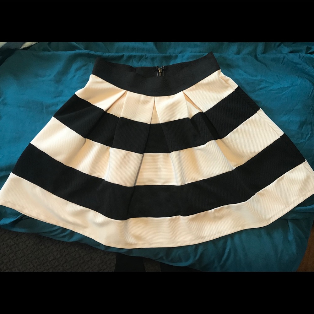 Thick cream and black skirt